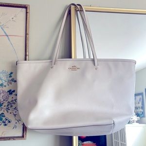 Older style, white “Coach” tote. Mid size.